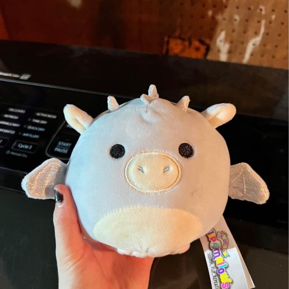 Pink and blue Dino flip squishmallow
